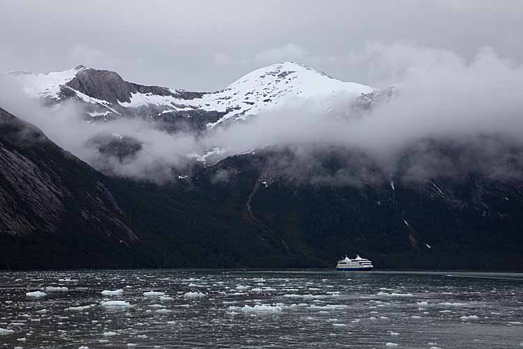 Quark Expeditions tourist ship in South Georgia Island bay.