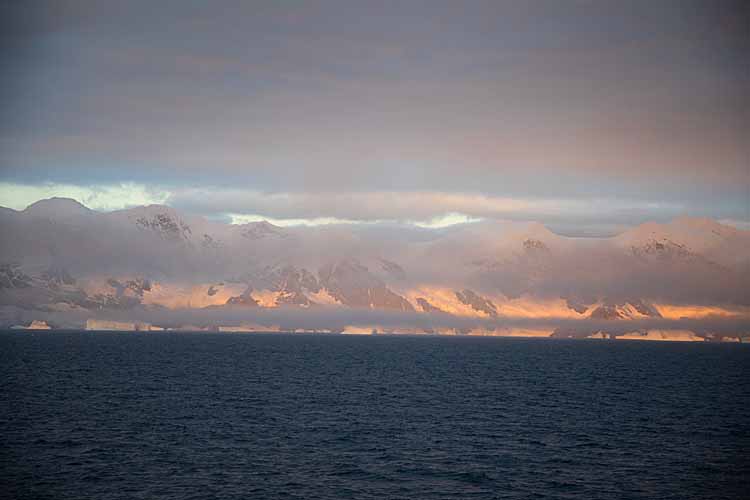 Sunset on coast of South Georgia Island.