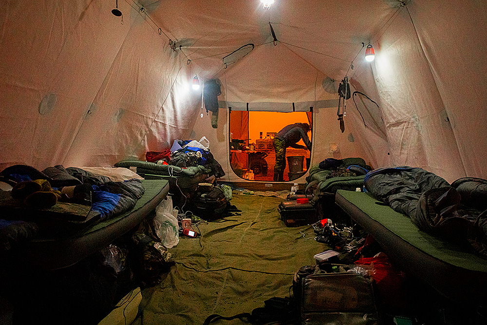 View from inside tent pitched south of Arviat showing smoke covered sky from forest fires in NWT.