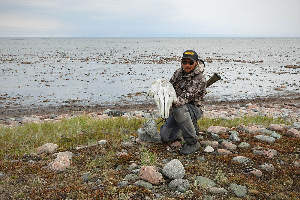 Guide with Beluga Whale (Delphinapterus leucas)