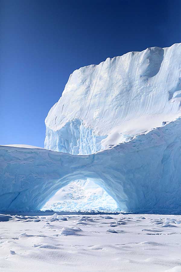 Ice formations with arch on sea ice near Baffin Island.