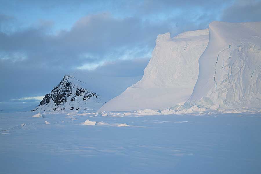 Sea ice and shoreline in arctic.