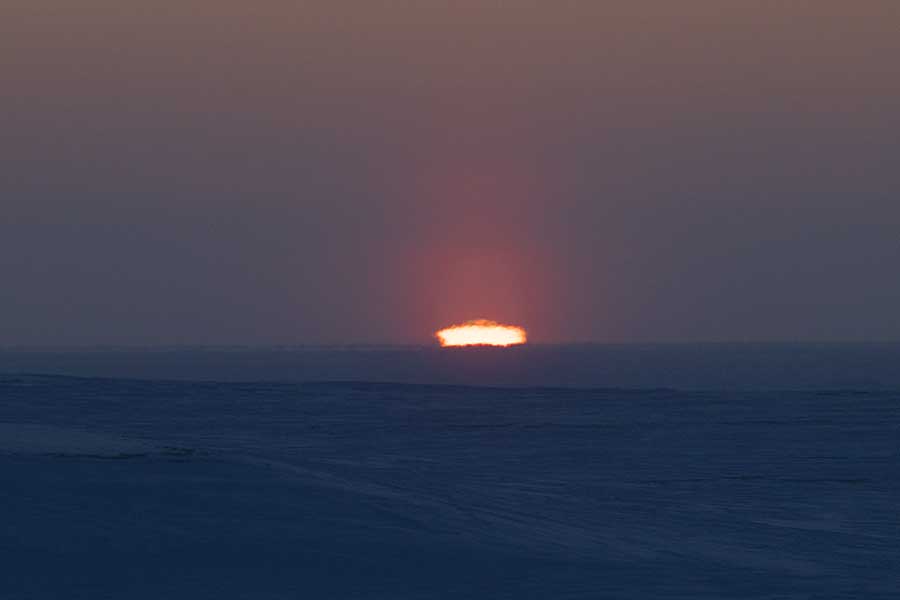 First light and sunrise of new year above arctic circle after 3 months of polar night.