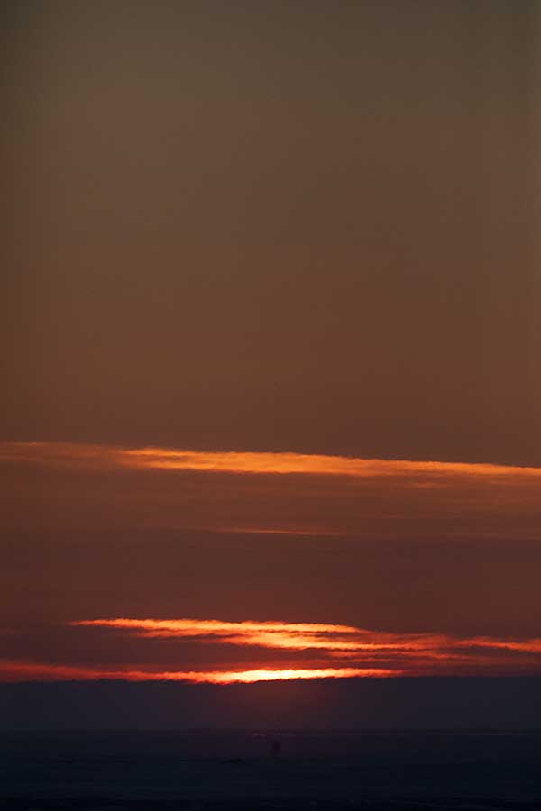 First light and sunrise of new year above arctic circle after 3 months of polar night.