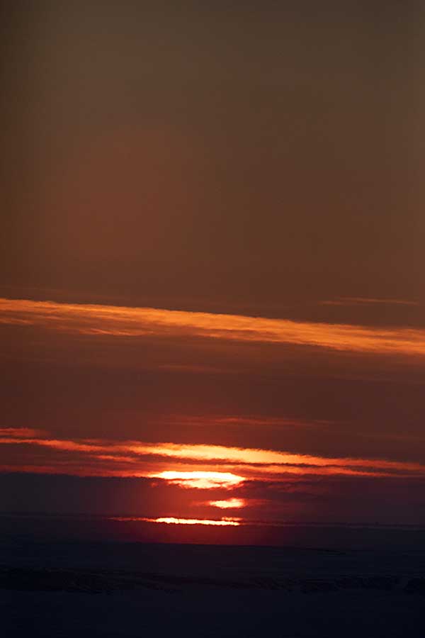 First light and sunrise of new year above arctic circle after 3 months of polar night.