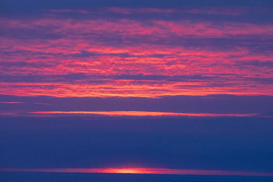 First light and sunrise of new year above arctic circle after 3 months of polar night.