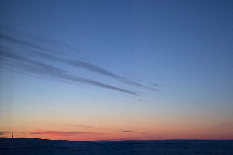 First light and sunrise of new year above arctic circle after 3 months of polar night.