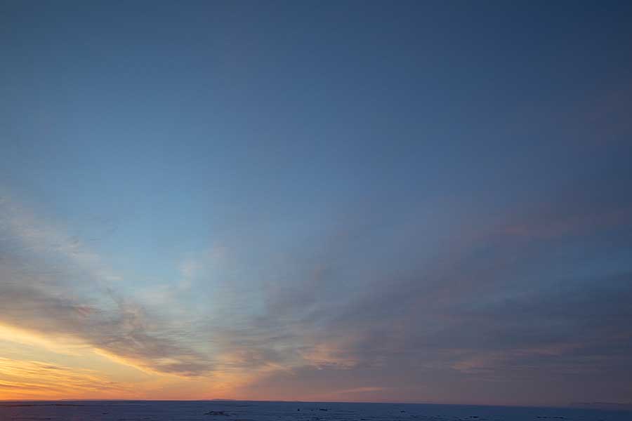 First light and sunrise of new year above arctic circle after 3 months of polar night.