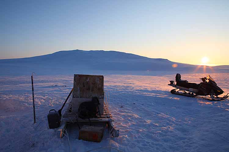 Snowmobile and sled, or qamutiik, on Cornwallis Island, Nunavut, Canada.